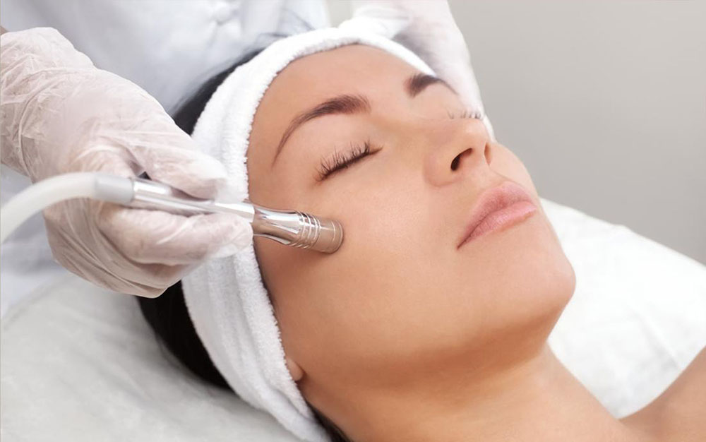 Close ups of wrinkles and skin imperfection on the face of a senior woman. Portrait of beautiful senior woman touching her perfect skin after a beauty treatment. Aging process concept.